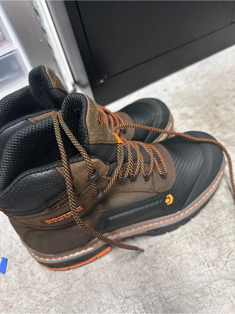 Wolverine Black and Brown Steel toe Work Boots with Orange Accents